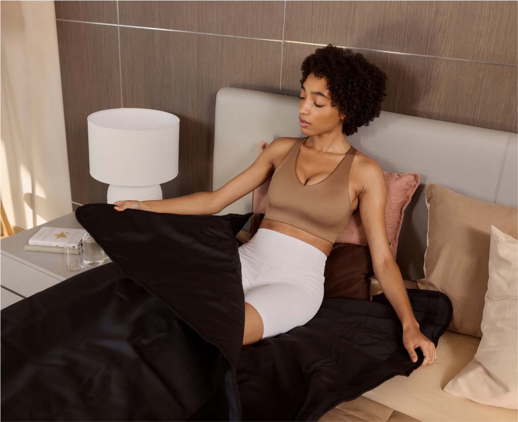 Woman Getting Out Of Sauna Blanket After Session