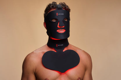 Man Wearing Red Light Face Mask and a Neck and Chest Mask