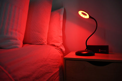 Blue Light Blocking Lamp Glowing on Bedside Table